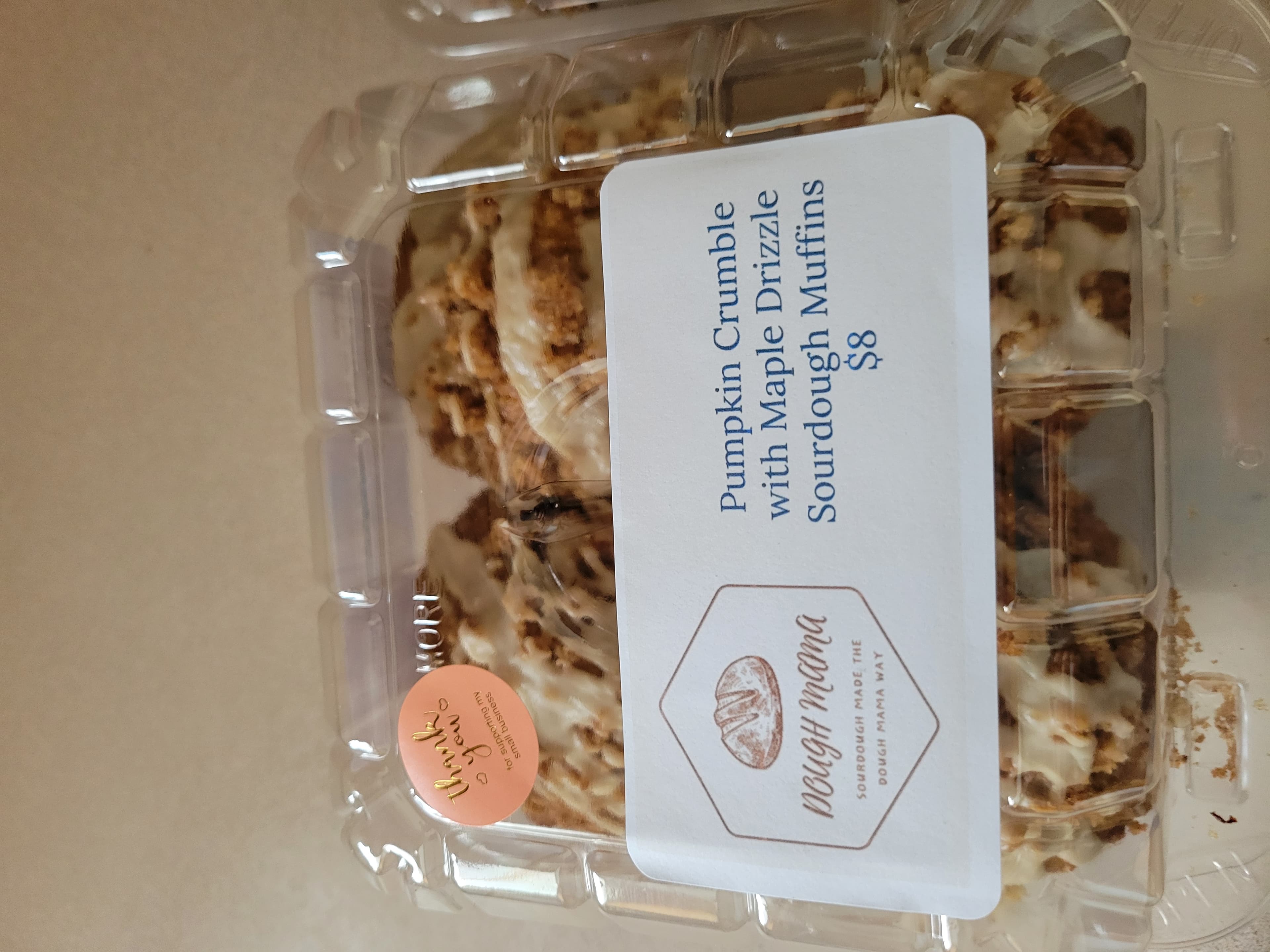 Packaged pumpkin crumble sourdough muffins with Dough Mama label